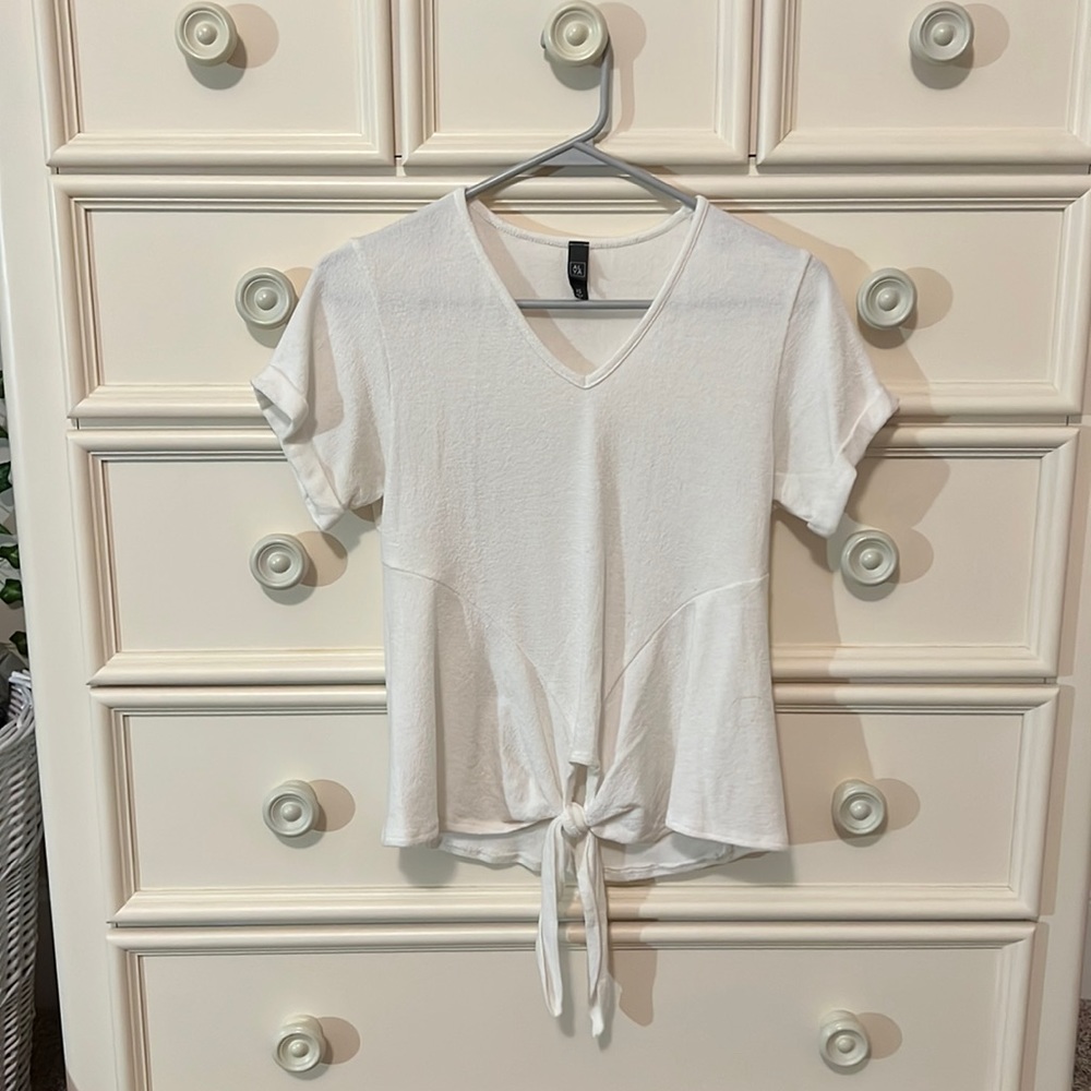 Francesca’s white v-neck